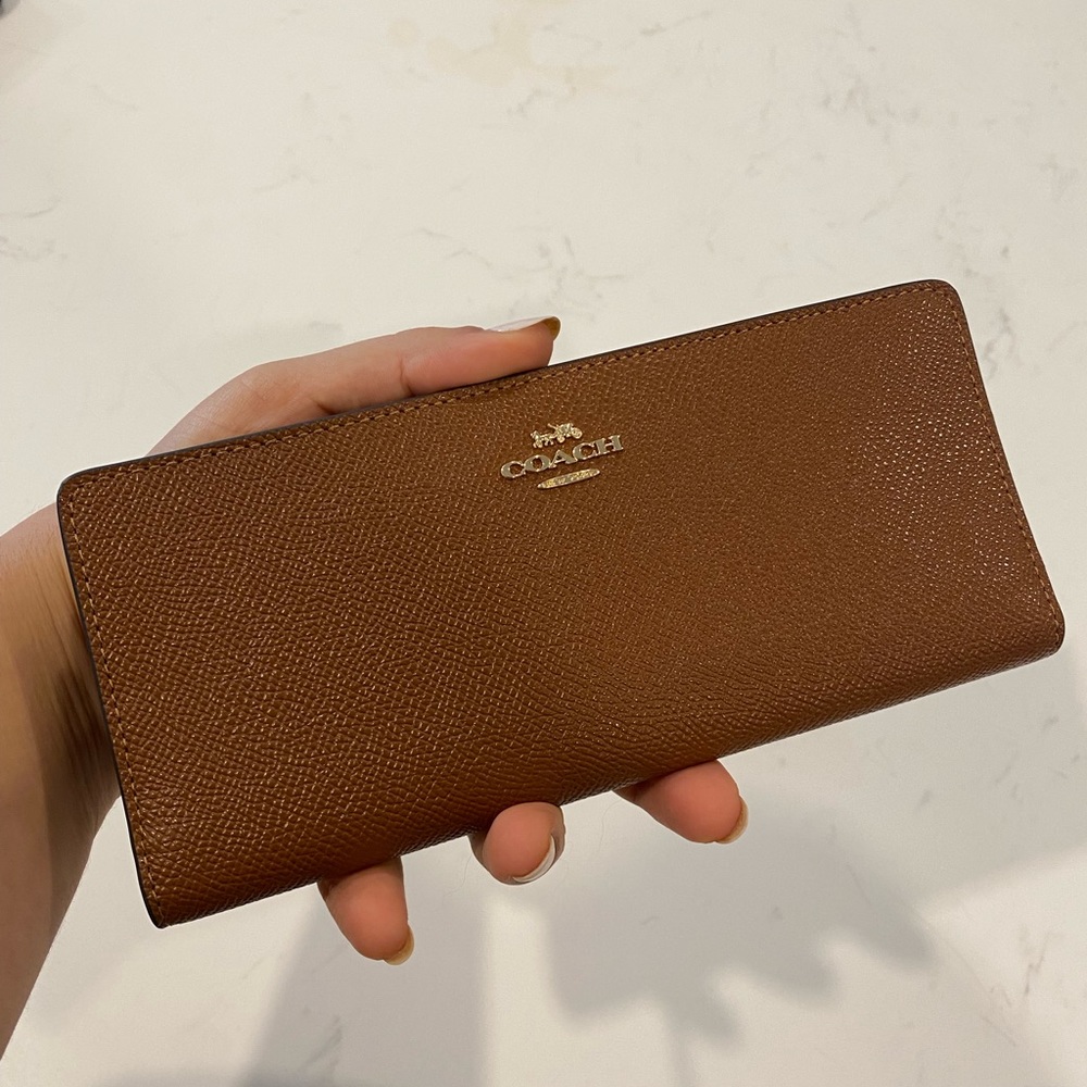 All leather brand new Coach wallet with gold hardware